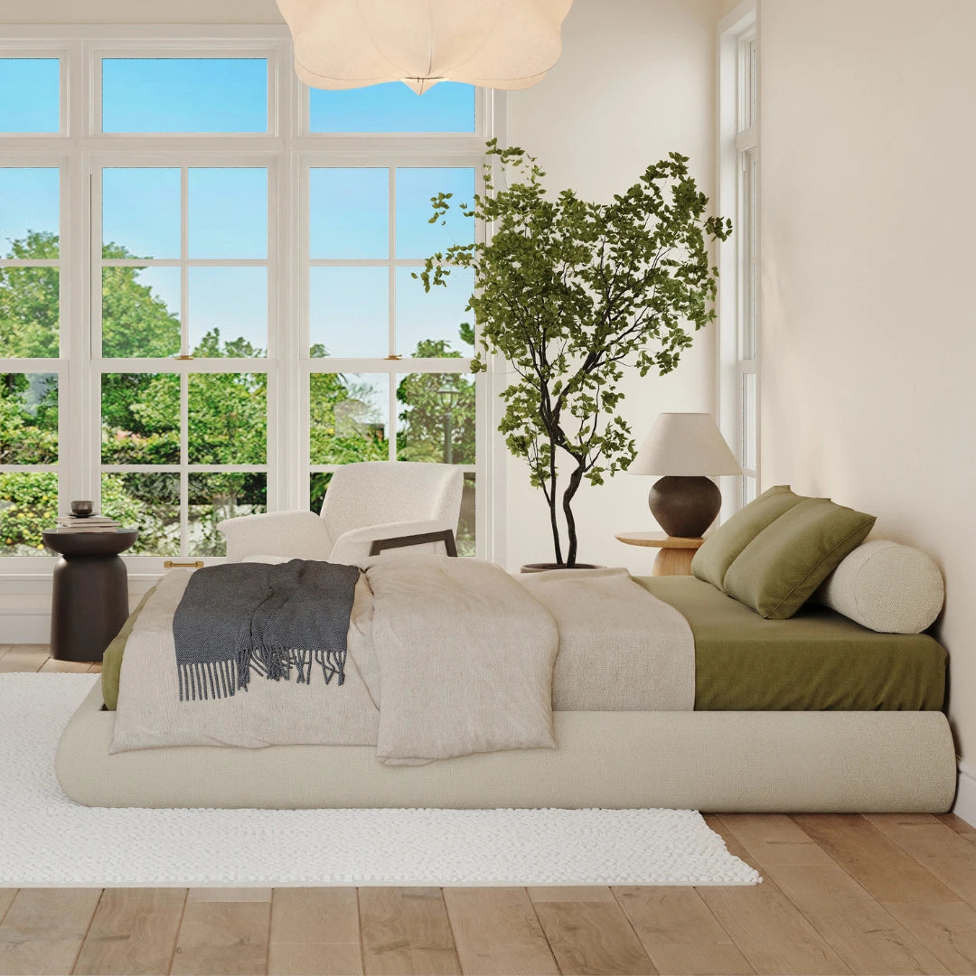 Luna dune bed frame| All cushioned bed frame| SoftFrame Designs| Beige bed| Bolster pillow| Side view angle