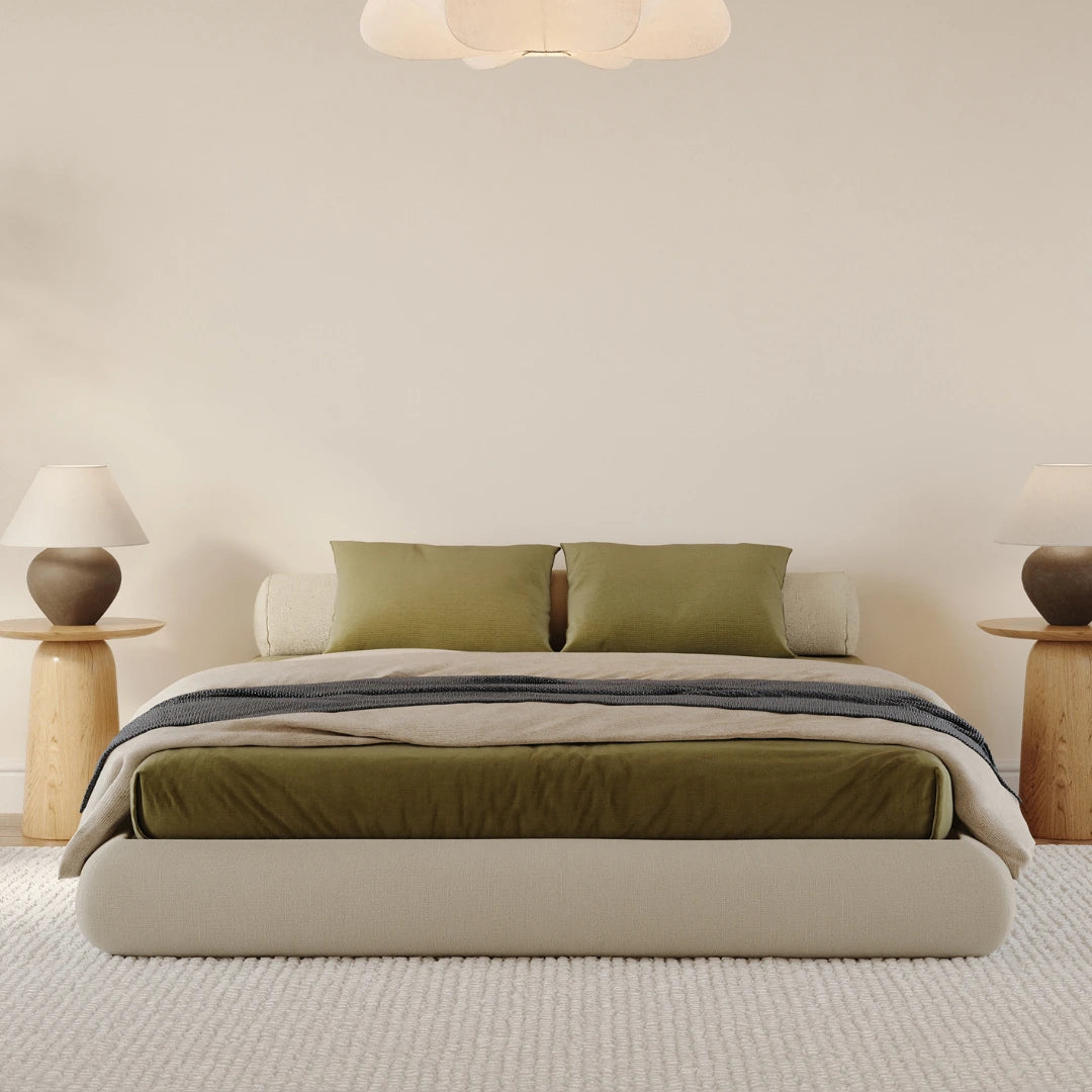 Luna dune bed frame| All cushioned bed frame| SoftFrame Designs| Beige bed| Bolster pillow| Front view angle