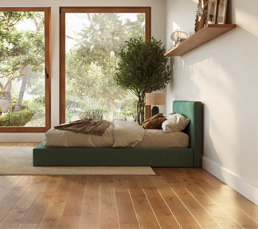 Green cloud bed frame in a warm toned bedroom with big windows | Ultra Bed Set in Forest green | SoftFrame Designs