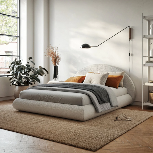 The Luna bed frame and headboard from SoftFrame Designs in a well decorated room with plants and shelves