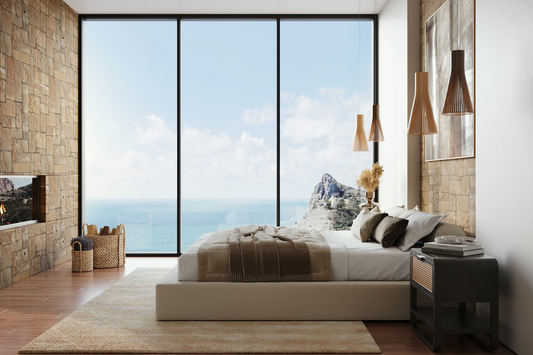 A SoftFrame Design bed frame in a high rise apartment with the ocean and sky in the window