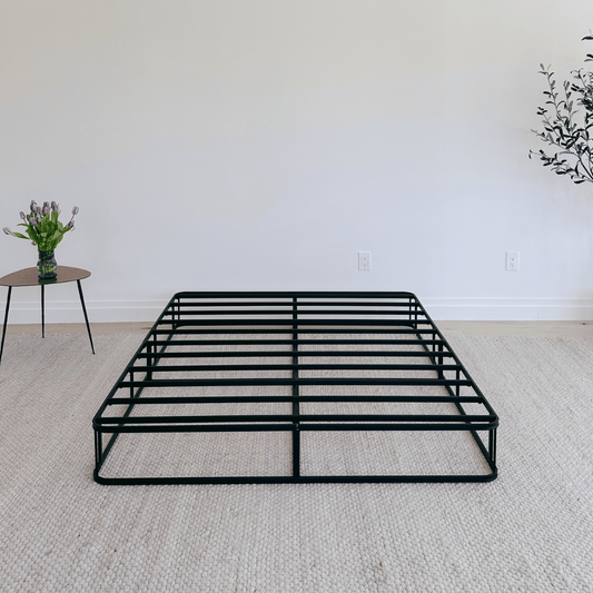 A gif showing how to set up a SoftFrame bed frame with a box spring