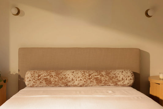 The Minimal Headboard: How a Bolster Changes the Way Your Bed Looks and Feels
