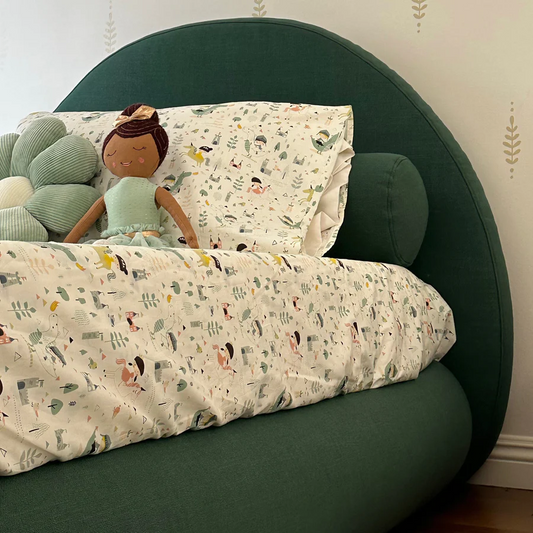 A Children's Luna bed frame and headboard set from SoftFrame Designs in the color Forest with forest animal print sheets