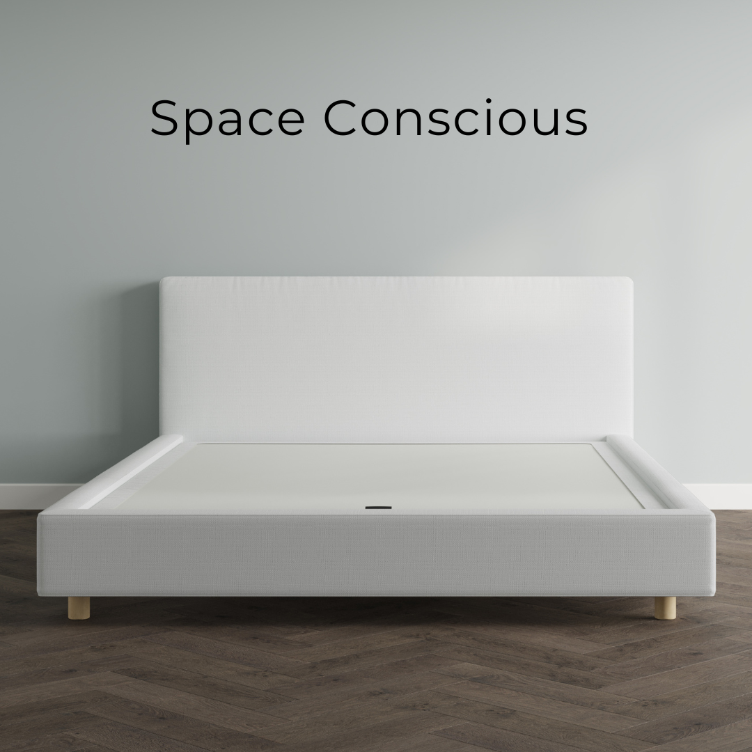 White bed frame paired with a lifted 9 inch tall box spring