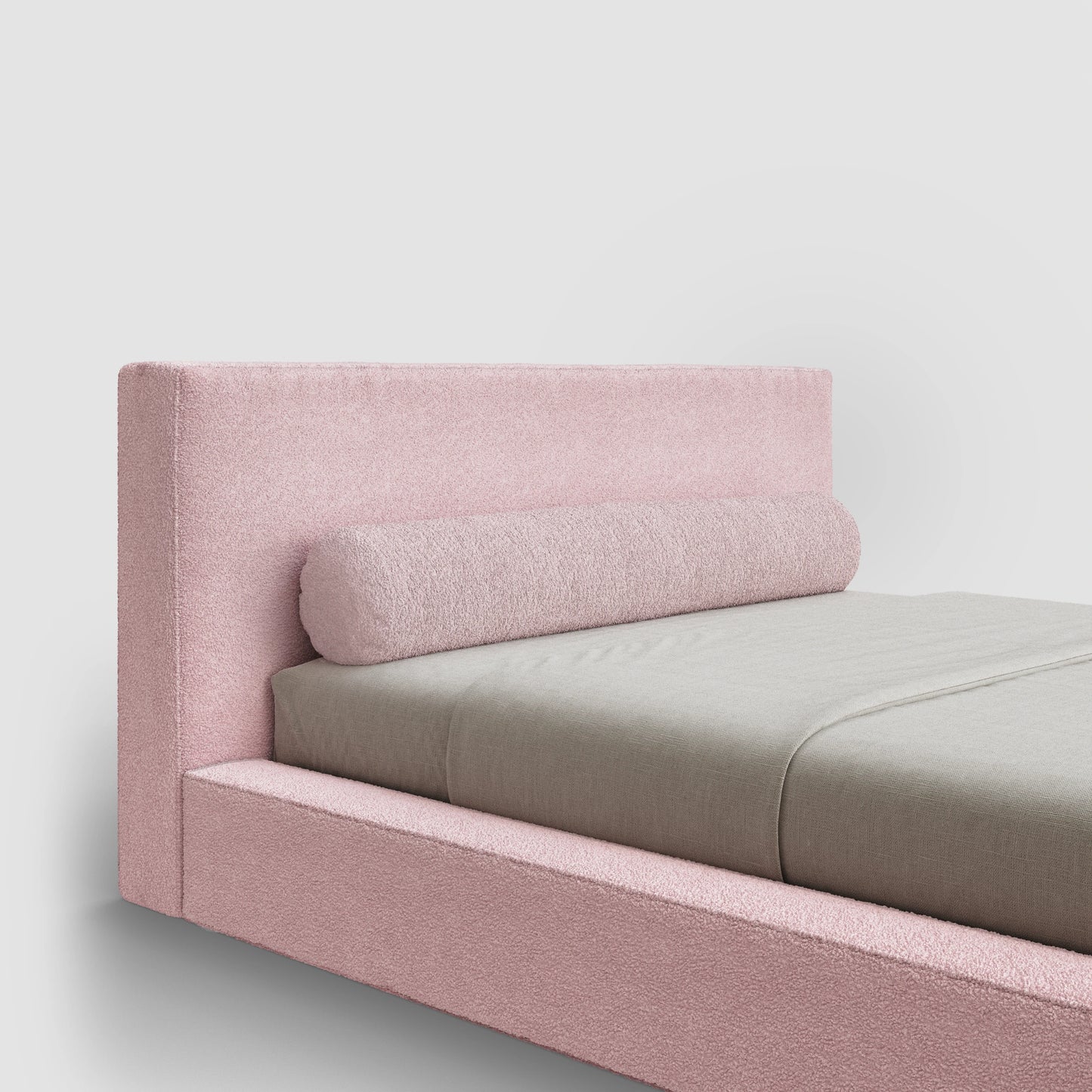 Round Bolster Pillow | Zippered Cover | Pink Cotton Candy Boucle Fabric | ¾ View | SoftFrame Designs