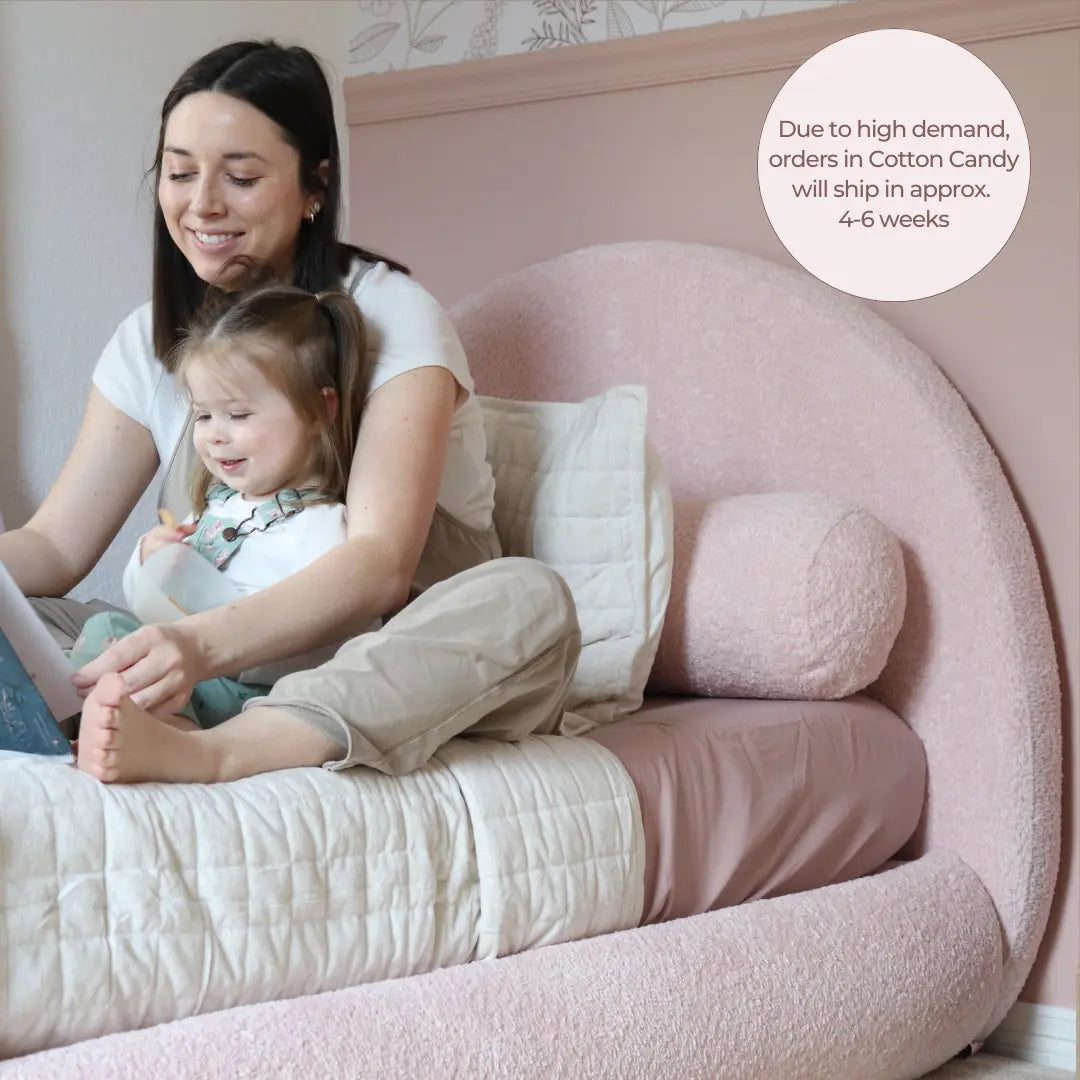 All cushioned headboard in kids room | Kids Luna headboard, twin, Cotton Candy pink, 3/4 view | SoftFrame Designs