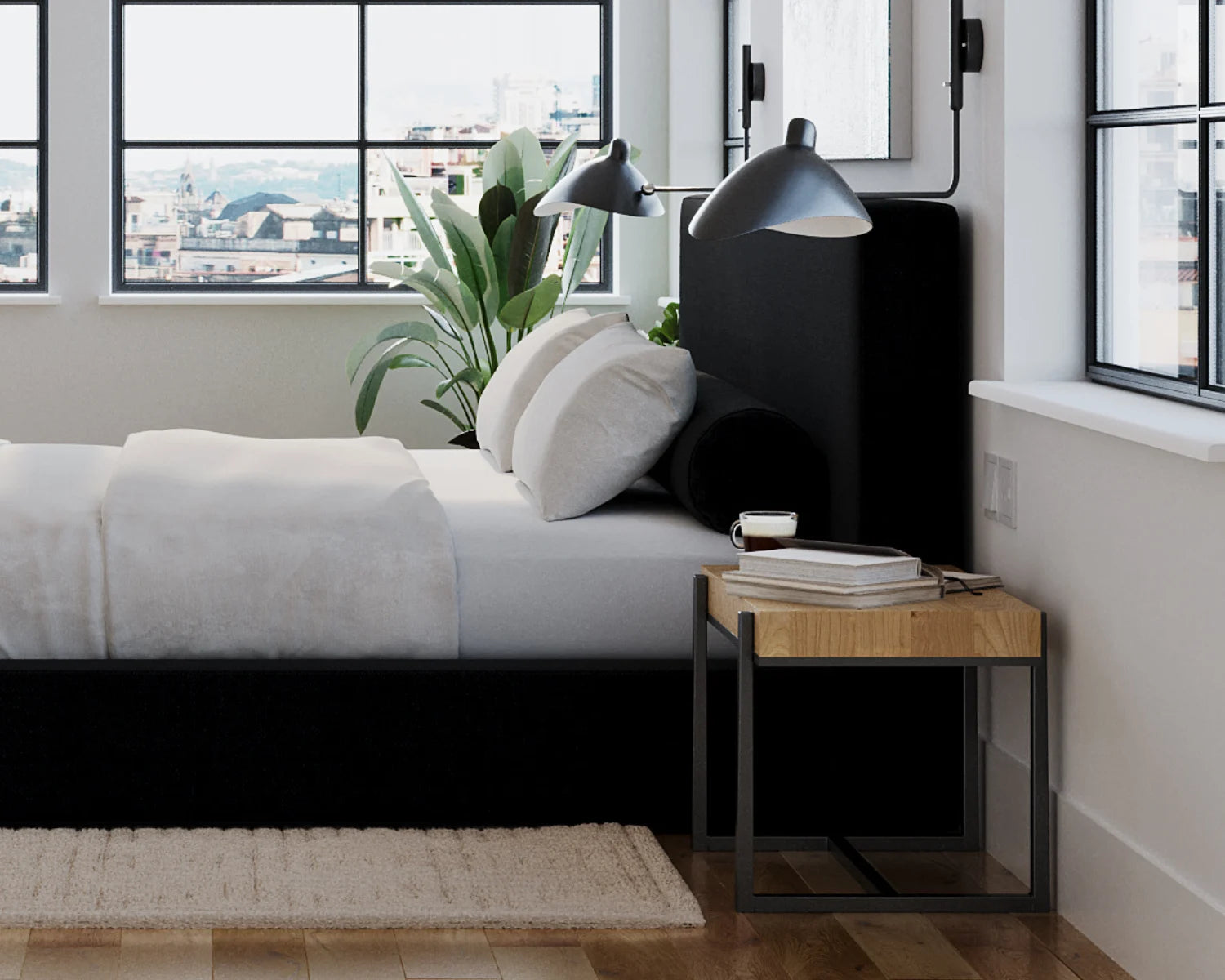 Modern bedroom with a bed, nightstand, and large windows.