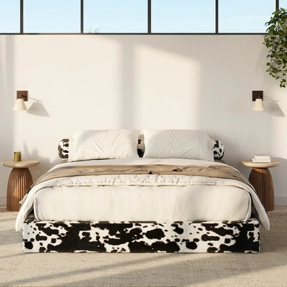 Bed with cow print footboard in a modern bedroom setting | Classic Bed Frame in Vegan Cowhide | SoftFrame Designs