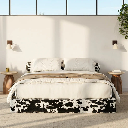 Bed with cow print footboard in a modern bedroom setting | Classic Bed Frame in Vegan Cowhide | SoftFrame Designs