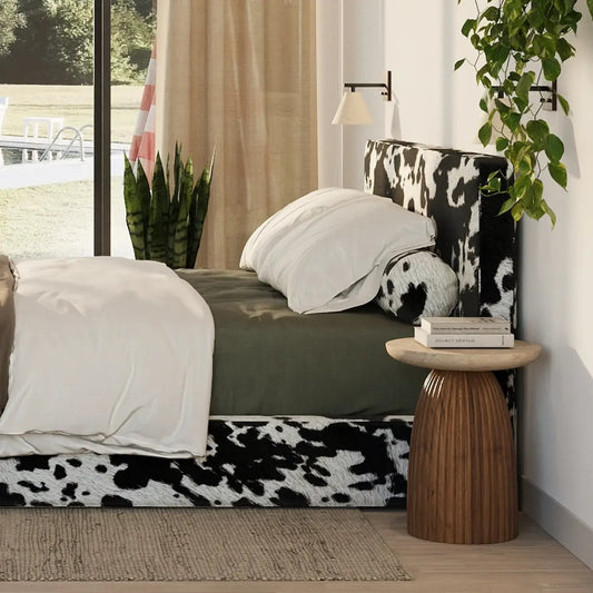 Modern bedroom with cow print bed and side table | Classic Headboard in Vegan Cowhide | SoftFrame Designs