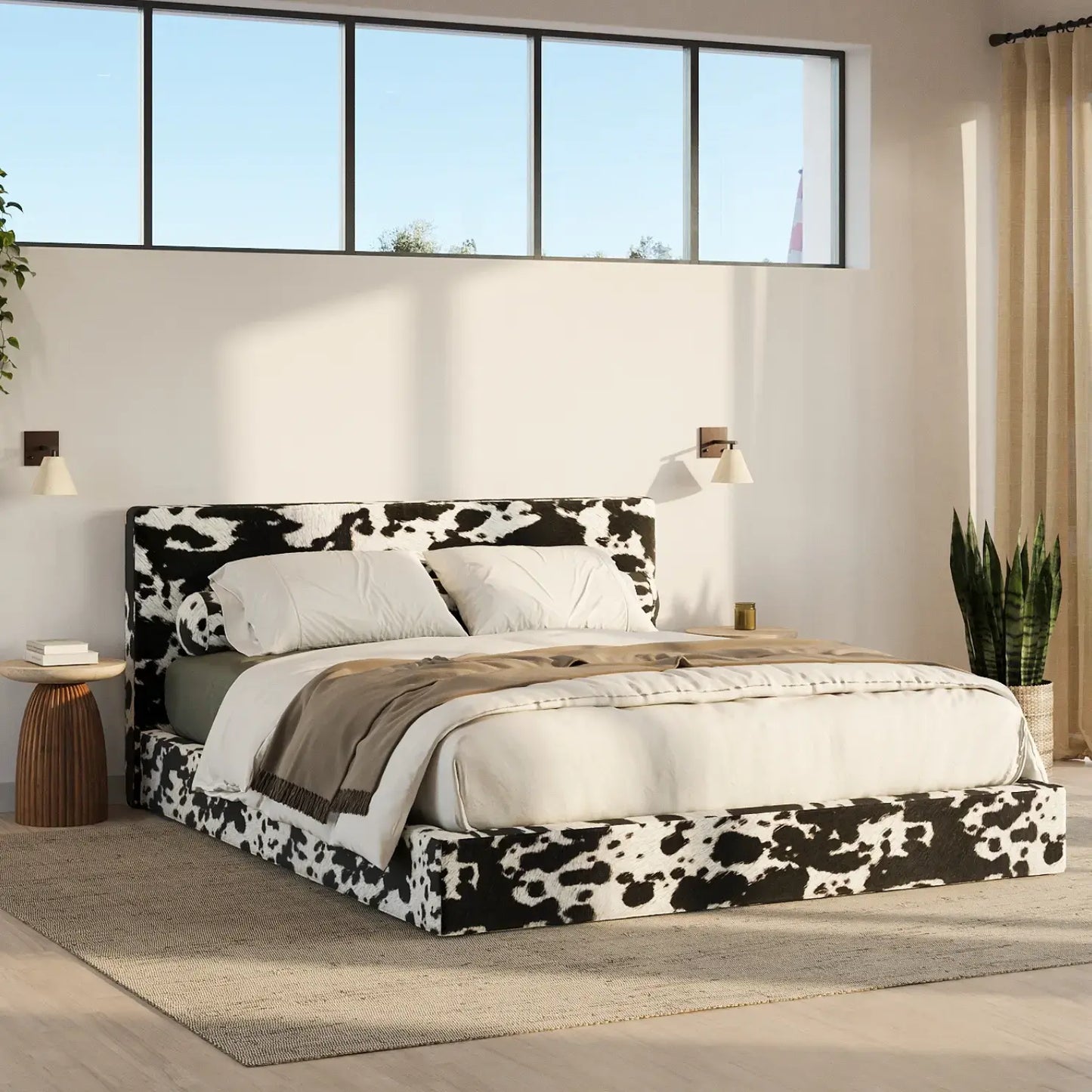 Bedroom with a cow print bed and large windows | Classic Bed Set in Vegan Cowhide | SoftFrame Designs