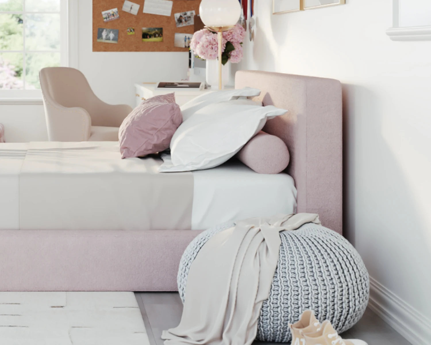 Pink all cushioned headboard in a girls bedroom