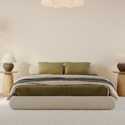 Luna dune bed frame| All cushioned bed frame| SoftFrame Designs| Beige bed| Bolster pillow| Front view angle